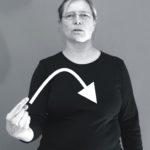 Nainen viittoo "tulla tänne"