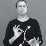 Nainen viittoo "onnistua"
